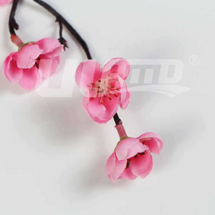 粉色仿真梅花枝條